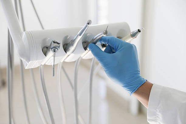 Professional Emergency Dentist technician working in Muscatine, IA